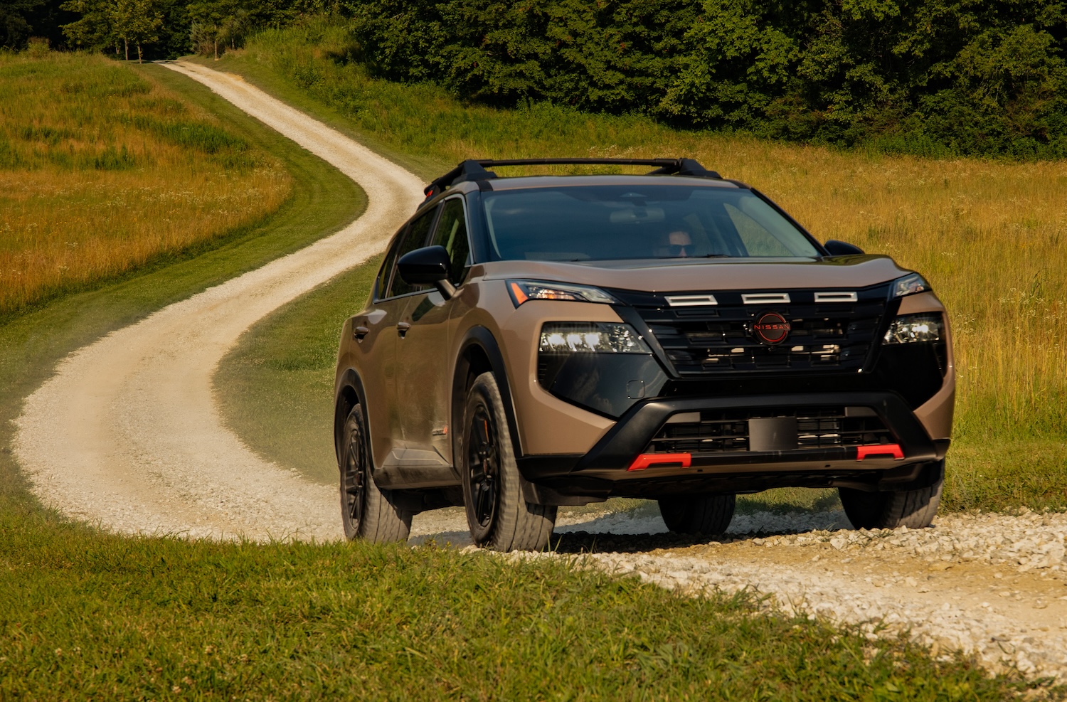 The 2026 Nissan Rogue on a dirt road