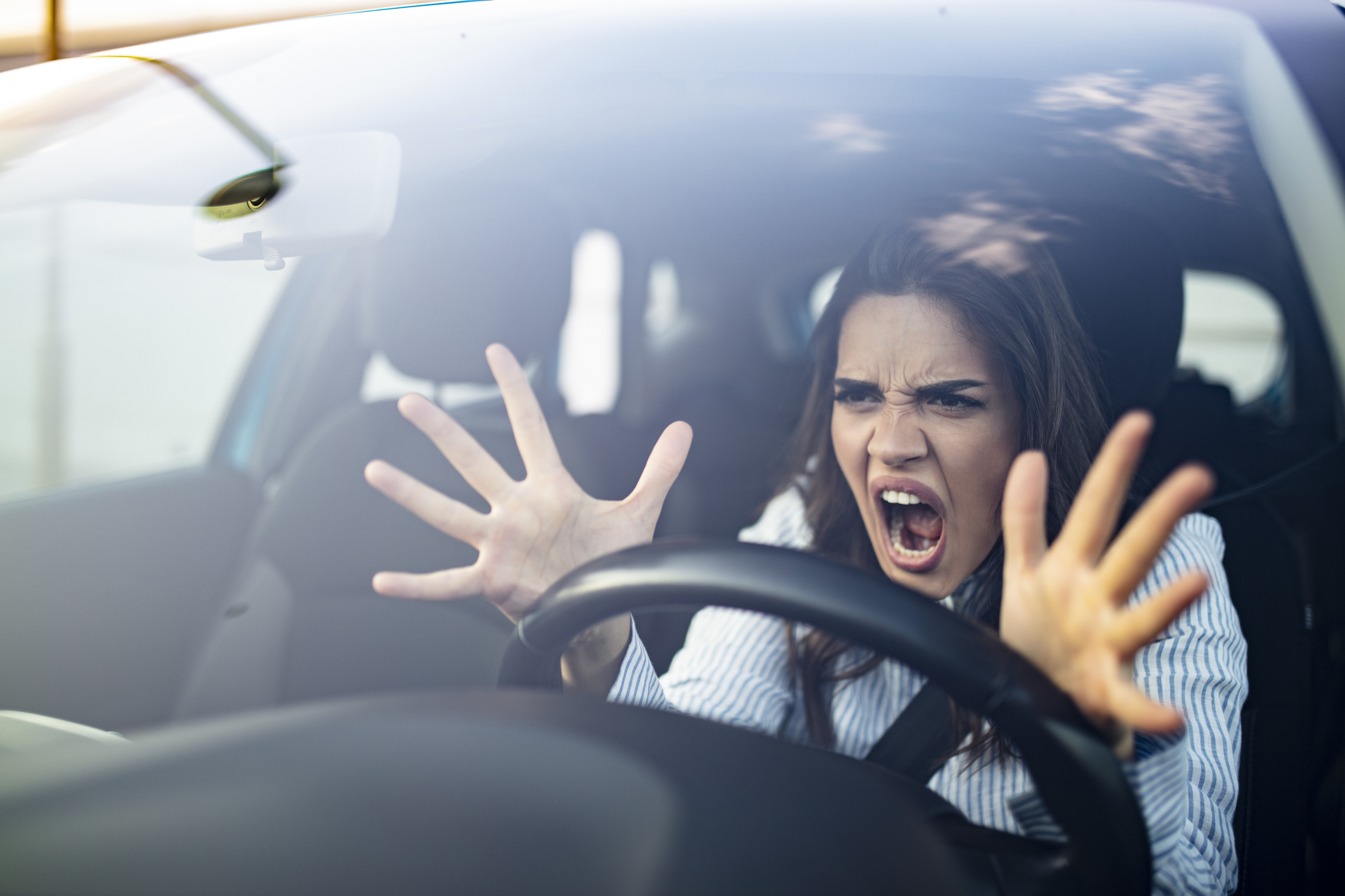 An angry woman driving