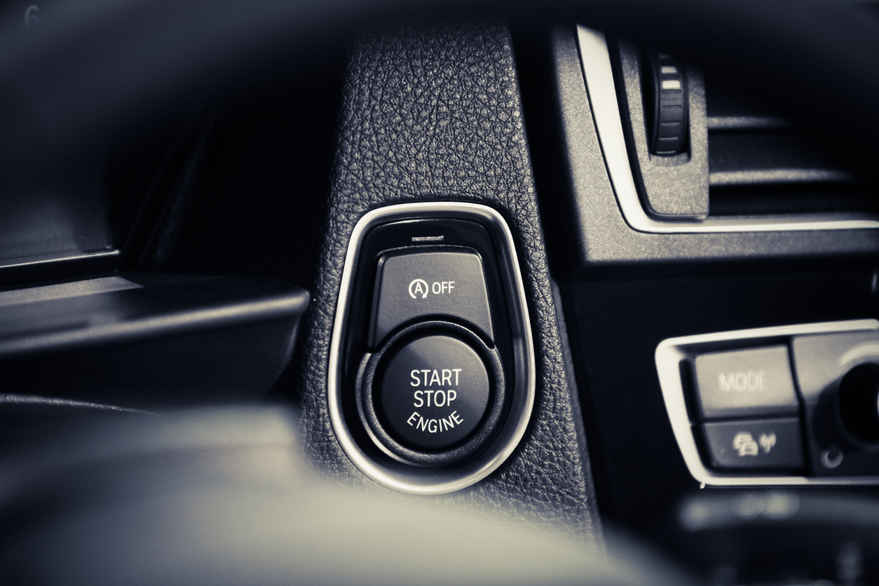 An auto start-stop button in a car
