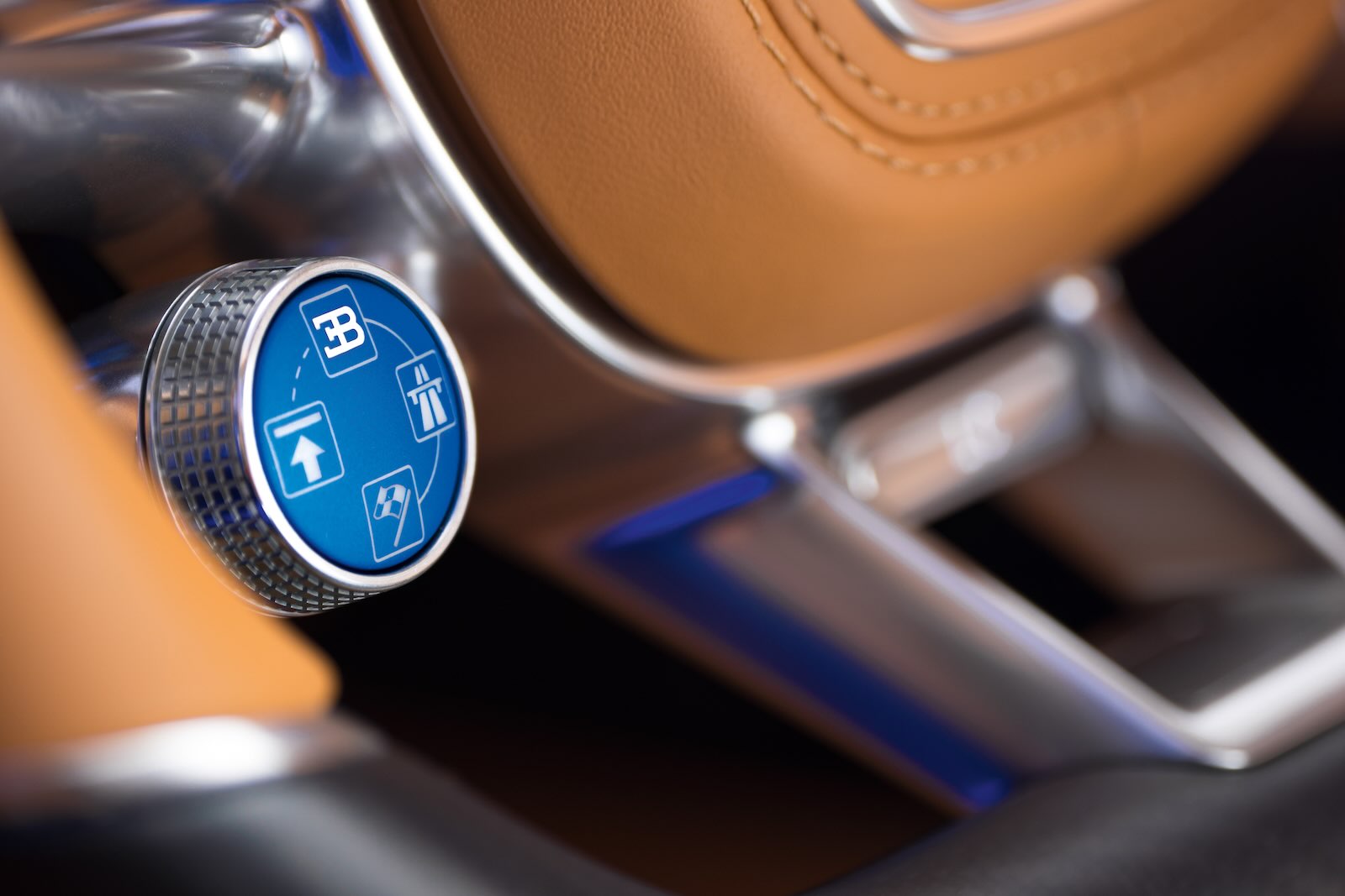 Knurled, milled aluminum toggle knob in a Bugatti Chiron interior