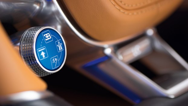 Knurled, milled aluminum toggle knob in a Bugatti Chiron interior