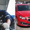 Mechanic checks car for issues (l) Red chevy cruze (r)