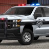 A Chevy Silverado police truck in gravel