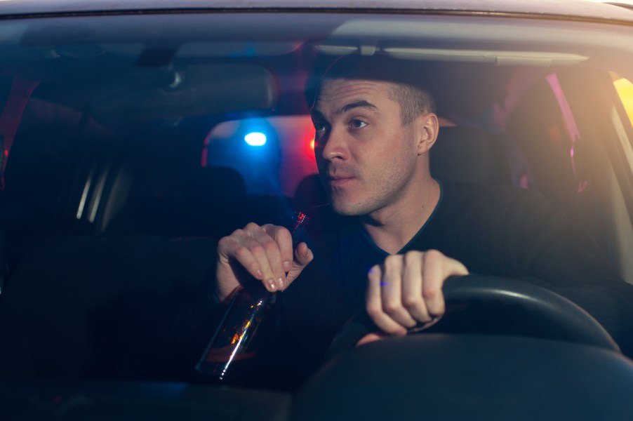 A drunk driver being stopped by police