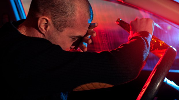 A drunk driver being stopped by police