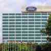 The Ford logo atop the company's world headquarters building in Michigan.