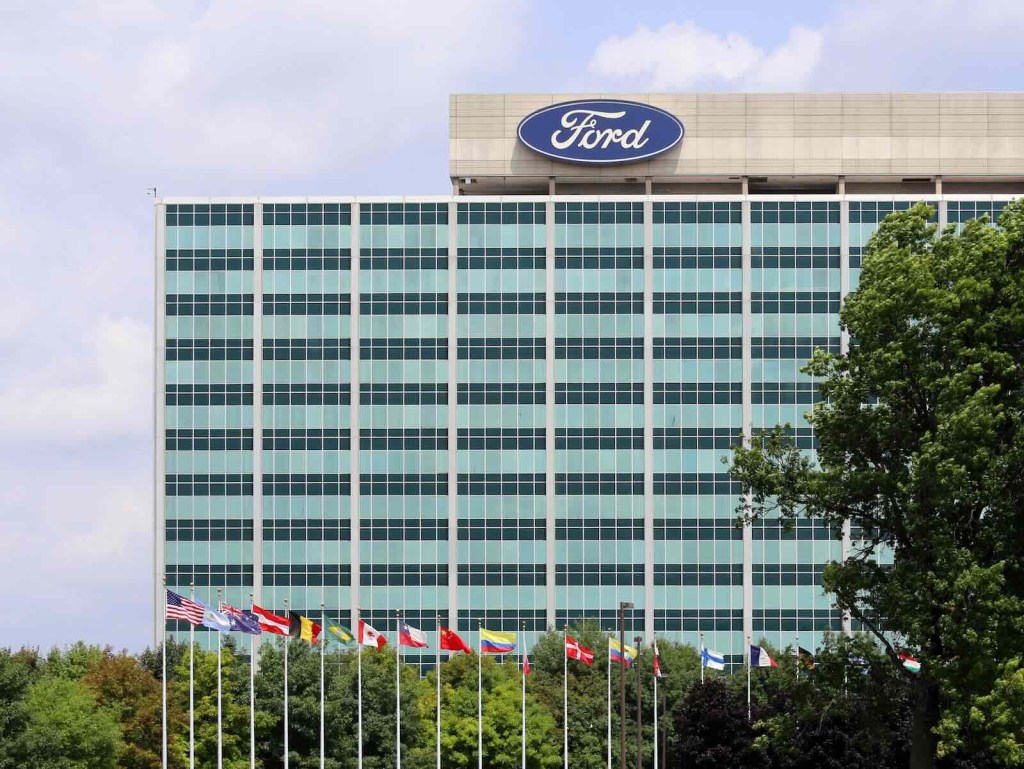The Ford logo atop the company's world headquarters building in Michigan.