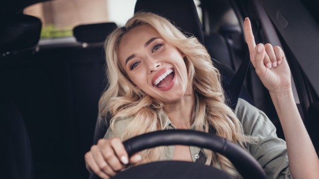 Wolman smiles while driver her BMW.