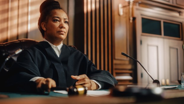 A judge in a black robe