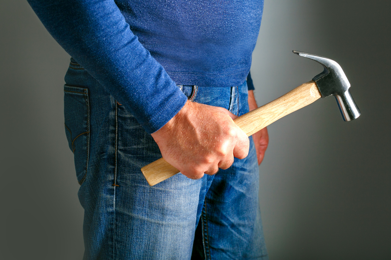 A man holding a hammer