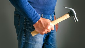 A man holding a hammer