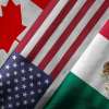 The Canadian, U.S., and Mexican national flags, stacked on top of one another