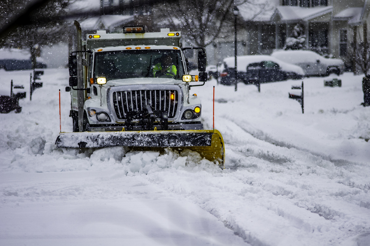 A plow truck clearing snow