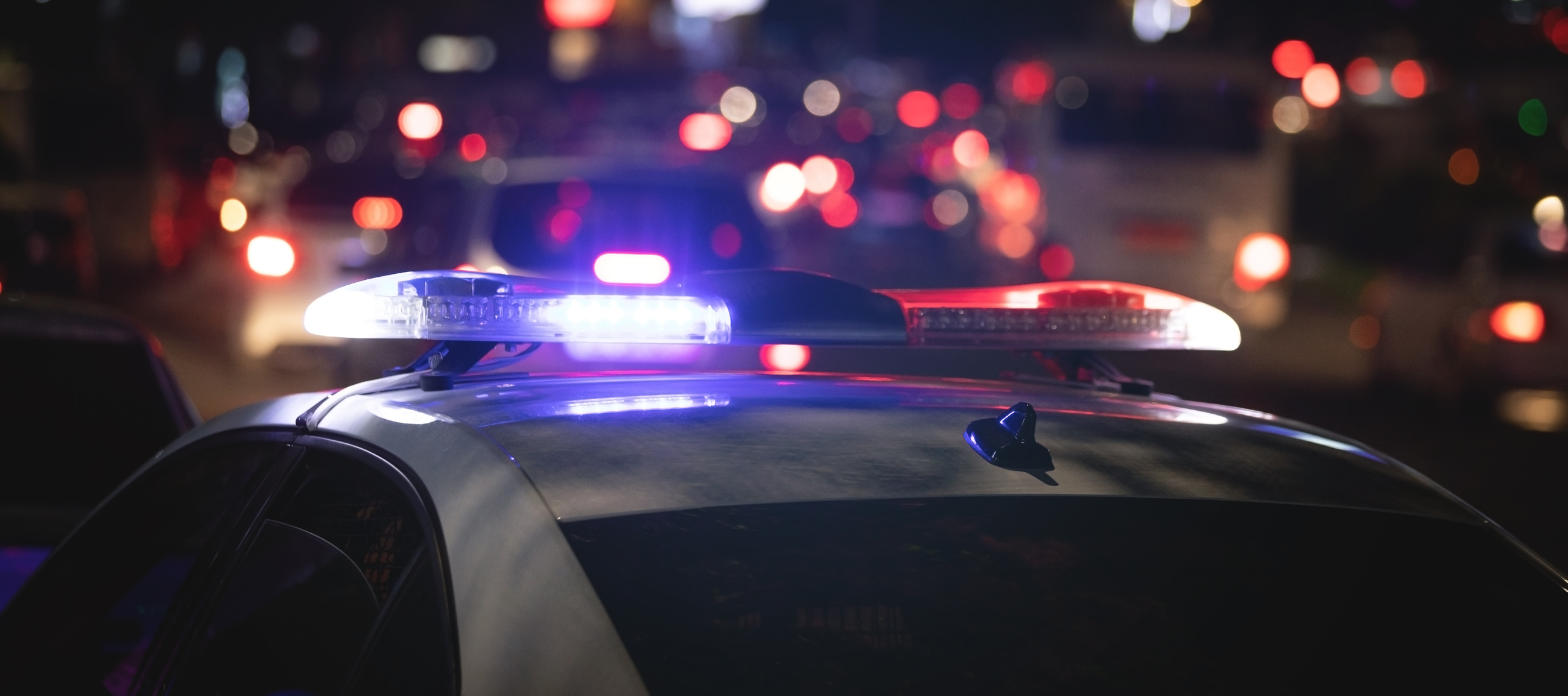 Police lights in a city at night