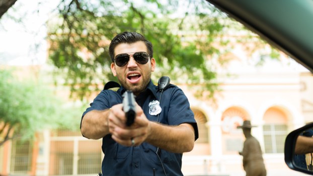 A police officer with a gun