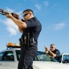 Police Officers holding guns