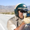 A Police Officer With Radar Gun
