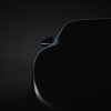 The outline of a a full-size sedan on a black background.