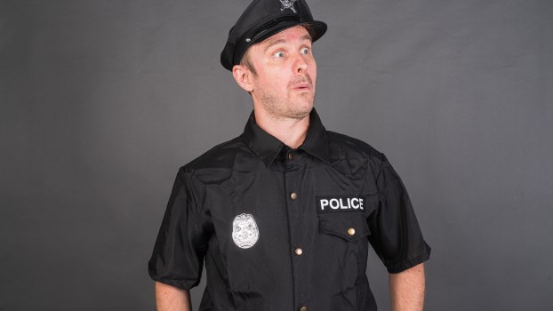 A surprised police officer