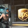 A UPS driver in a delivery truck