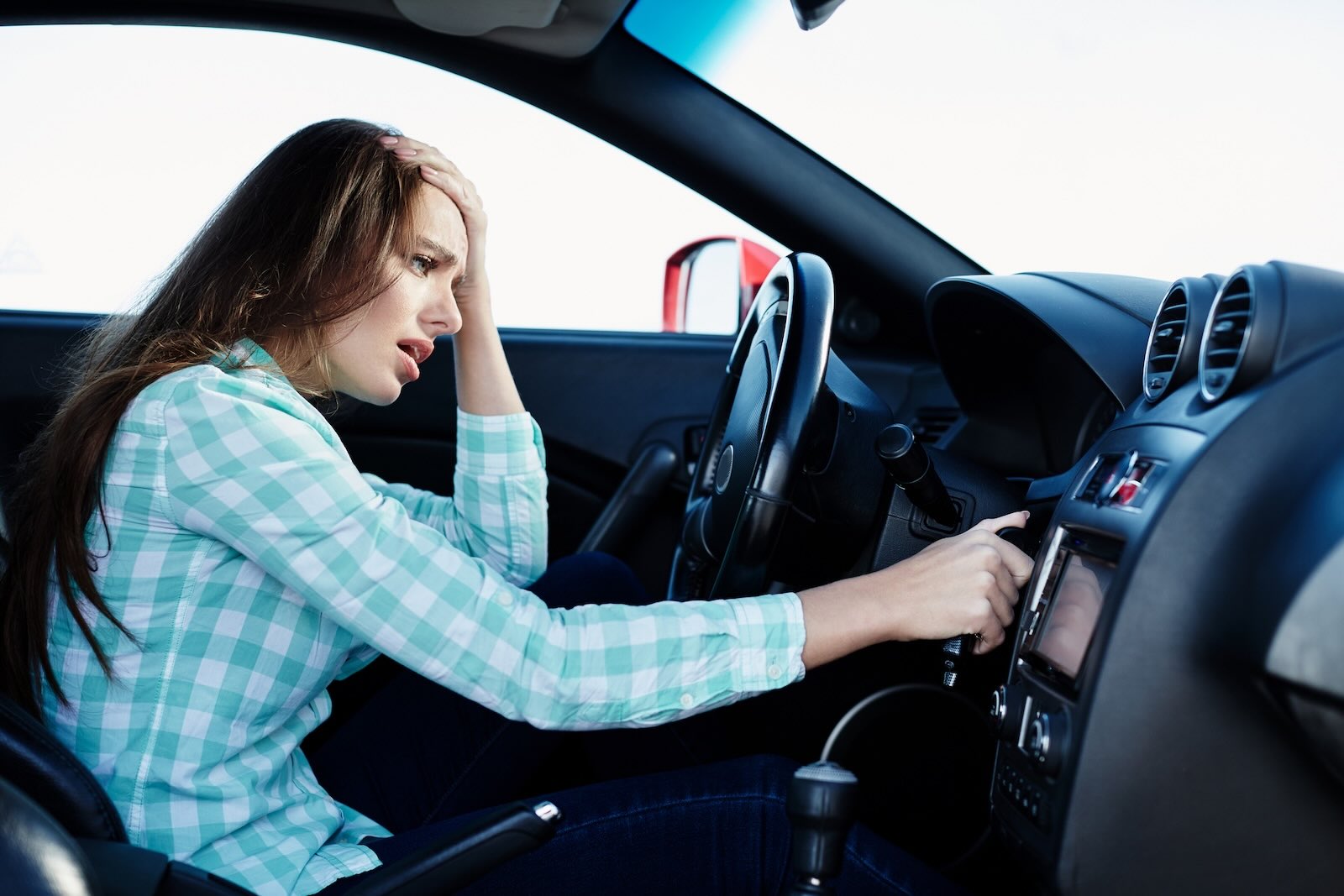 Driver tries to start an unreliable new car.