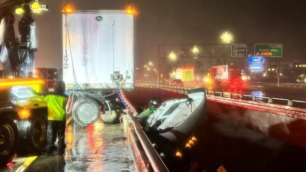 semi-truck-dangling-70-foot-drop