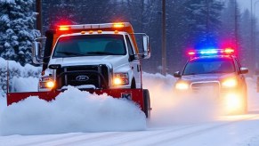 snow-plow-chased-by-police-car