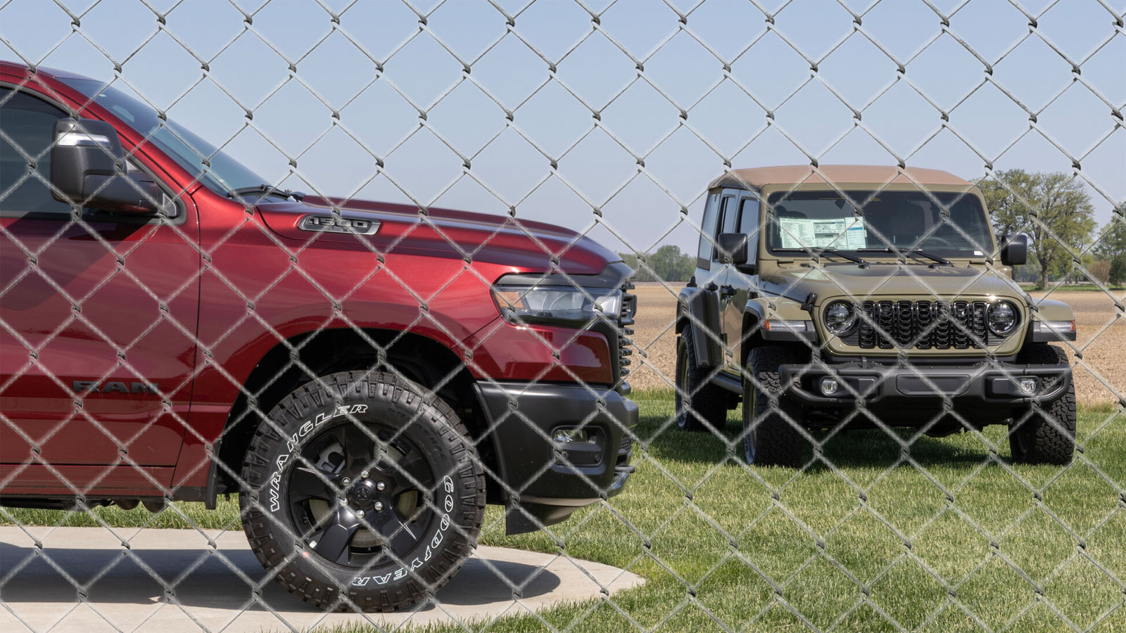 stellantis-dodge-jeep-behind-chain-link-fence