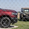 stellantis-dodge-jeep-behind-chain-link-fence
