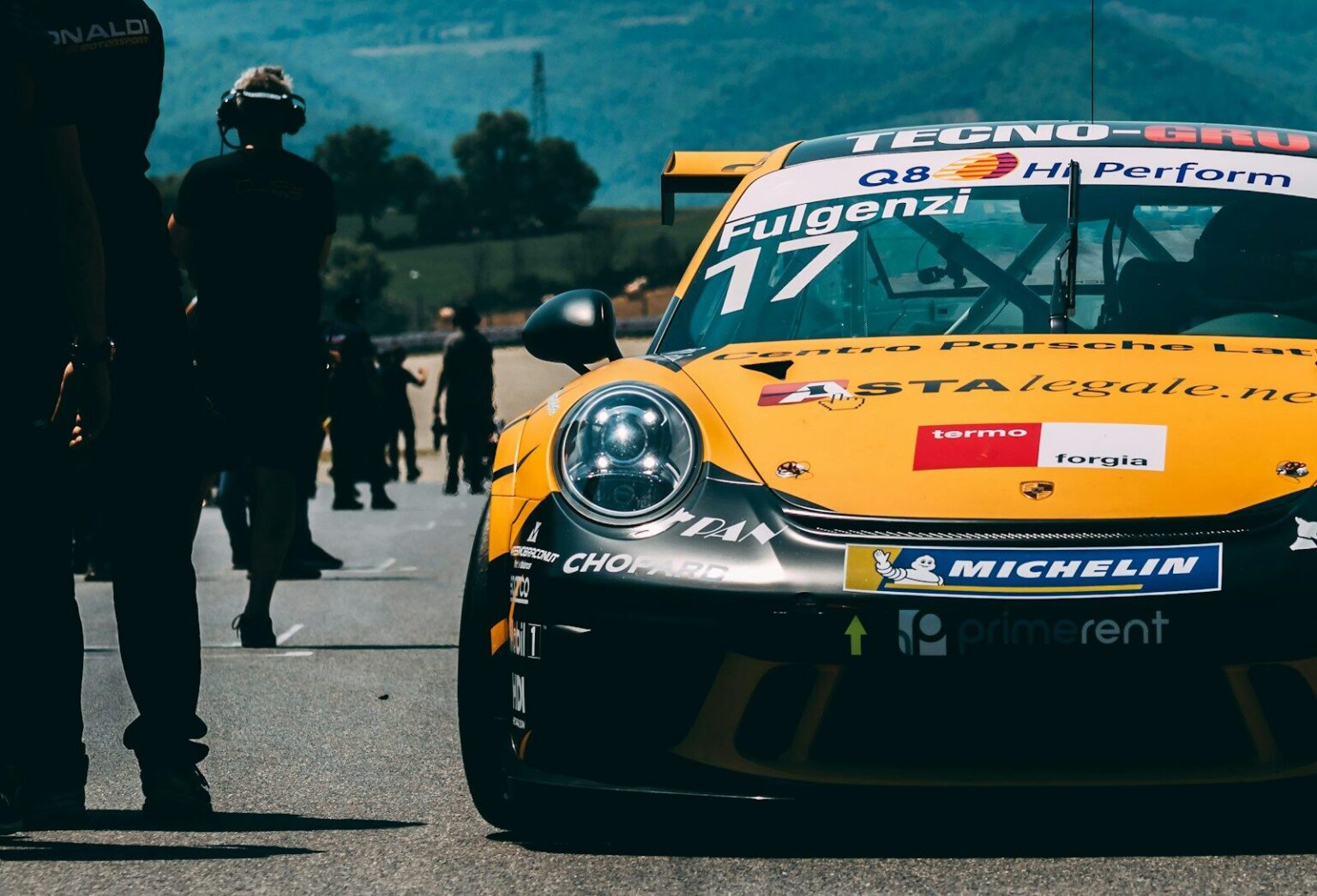 yellow an black sports coupe. Porsche
