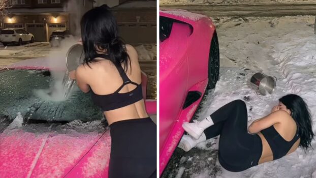 "A woman stands outside in a snowy residential neighborhood at night, holding a large metal pot of steaming water over the frosted windshield of a bright pink Lamborghini