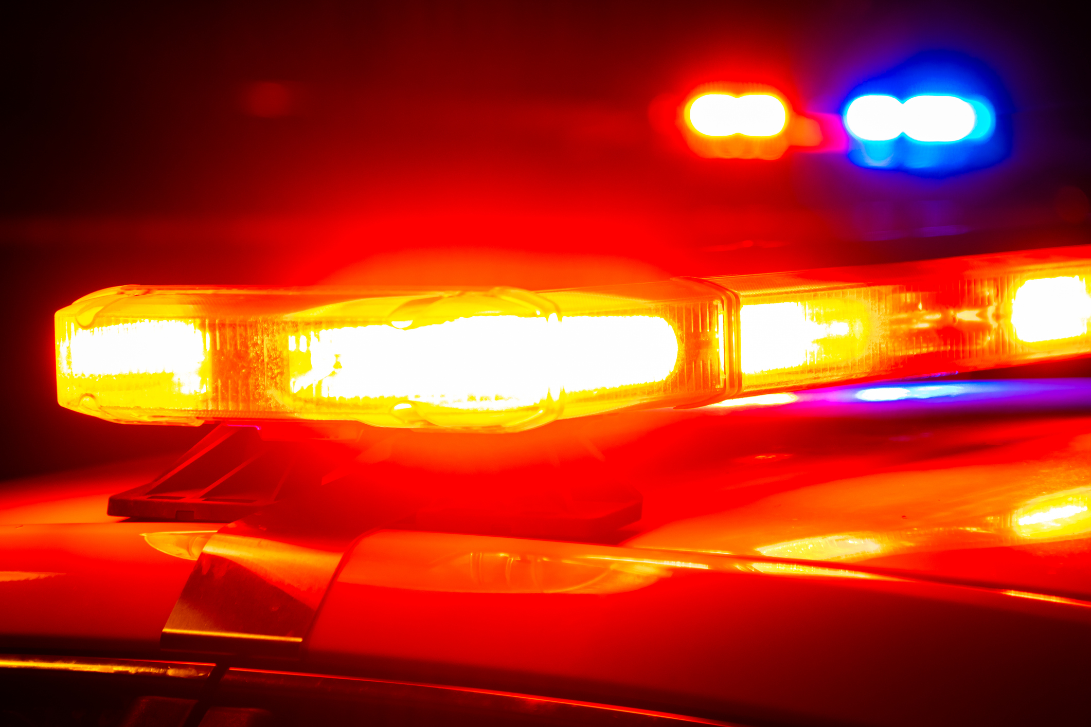 Police lights on cars at night