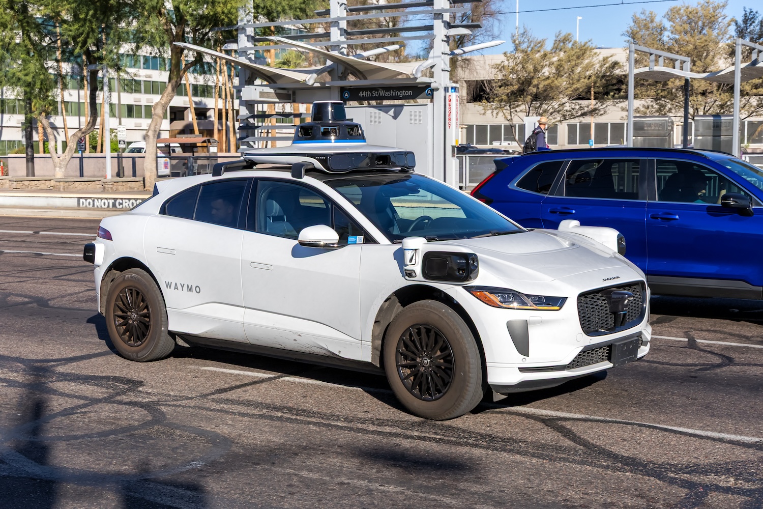 A Waymo robotaxi Taxi in traffic