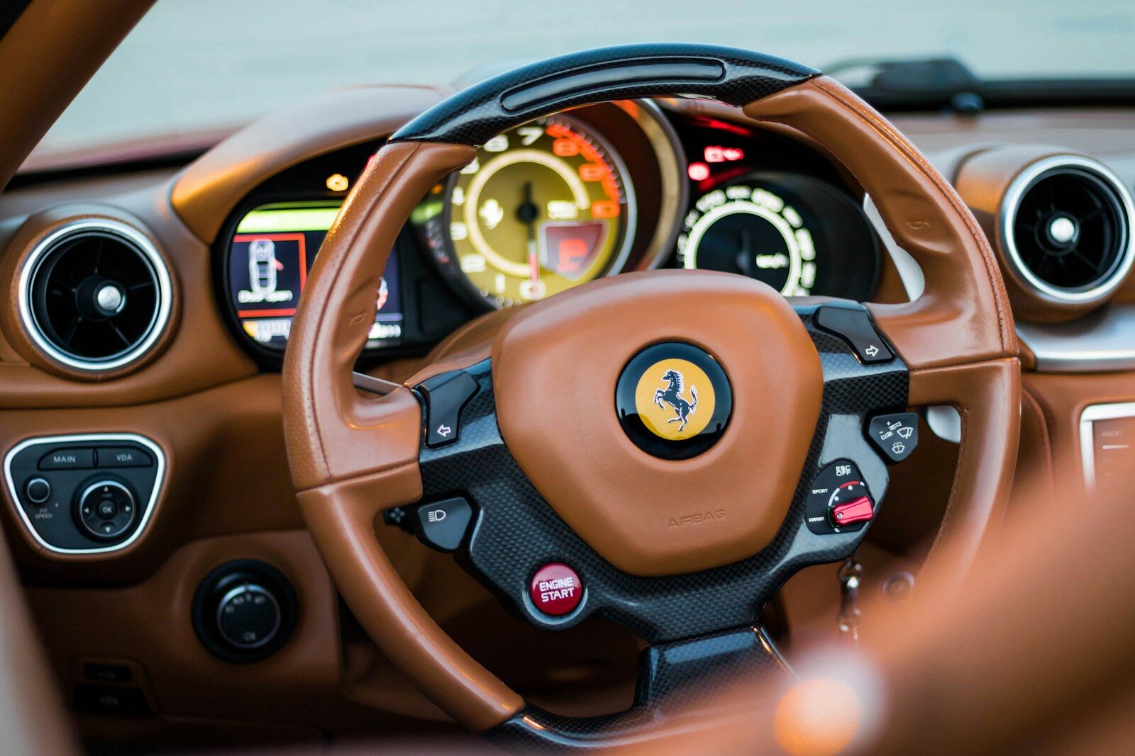 a steering wheel and dashboard of a car