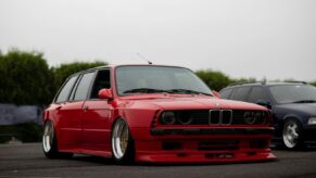red bmw m 3 on road during daytime