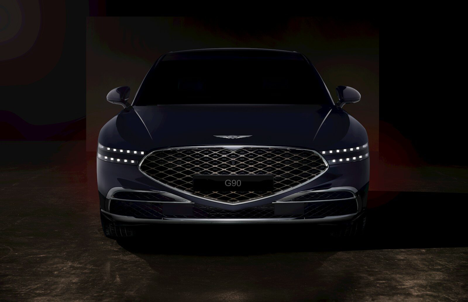 a black car with a silver grill