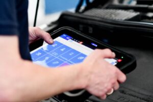 person playing game on black laptop computer