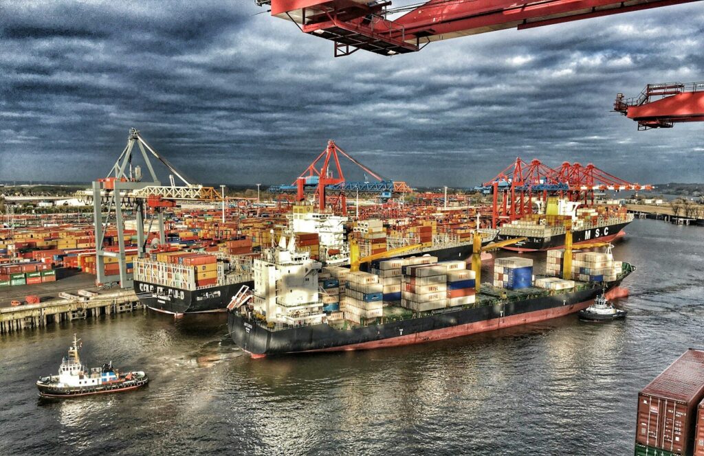 a large cargo ship in a large body of water. Hyundai