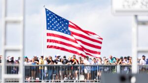 Fans watch from the grandstands at Pocono Raceway before a NASCAR race weekend in Pennsylvania