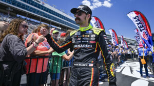 Ryan Blaney greets fans during pre-race ceremonies before a NASCAR Cup Series race at Texas Motor Speedway.