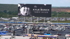 A large tribute board honoring Kyle Busch overlooks Charlotte Motor Speedway during the Coca-Cola 600 weekend.