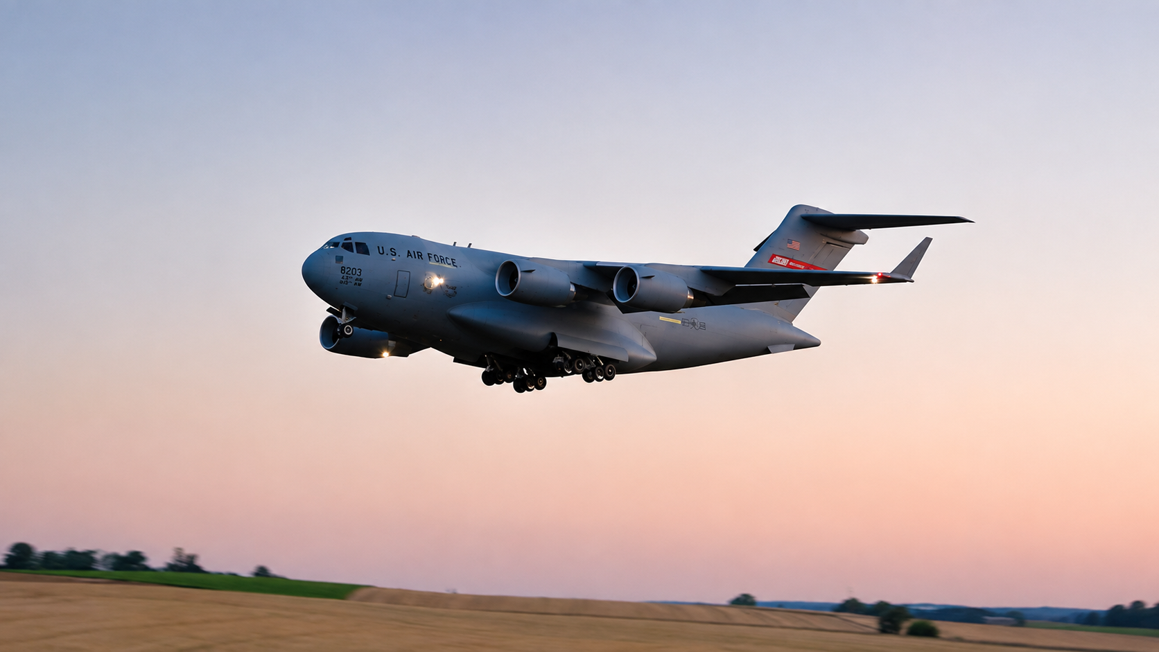 A 21-Foot-Wide RC Boeing C-17 Took to the Sky at Sunset—With the Landing Gear Stuck Down