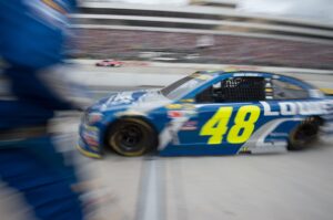 Jimmie Johnson pulls in for a pit stop during the Citizen Soldier 400 NASCAR Sprint Cup Series race at Dover International
