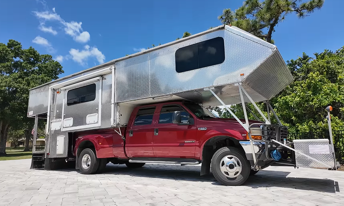 He Spent 6 Years Turning a Ford Truck Into a 30-Foot Diamond-Plated RV—and Now You Can Buy It