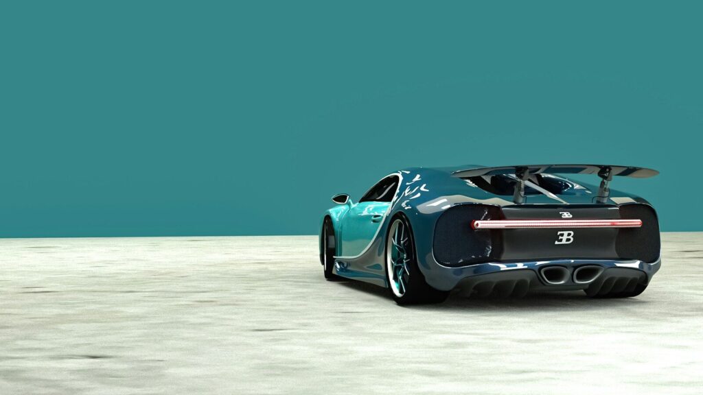a blue sports car parked on a concrete surface