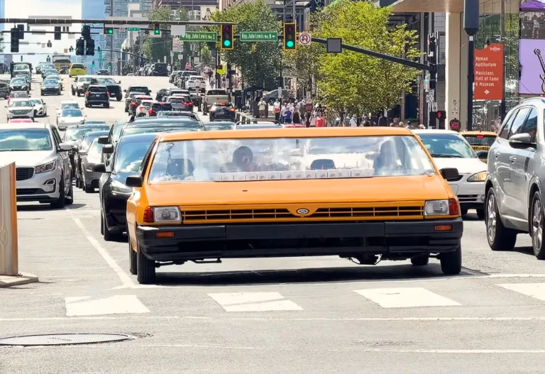 YouTuber Turns a Tiny Ford Festiva Into a Bizarre 10-Foot-Wide Highway Monster