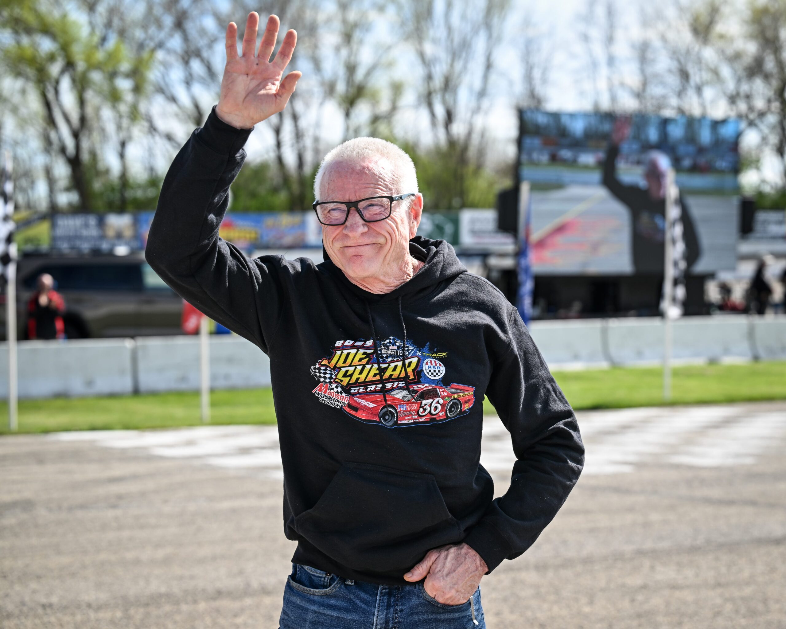 NASCAR Hall of Famer Mark Martin, serving as grand marshal for the ASA Midwest Tour Joe Shear Classic, waves to the crowd