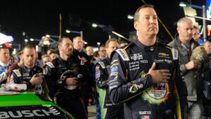 Kyle Busch during the national anthem before the NASCAR Cup Series Duel during Speedweek, Thursday, Feb. 12, 2026.